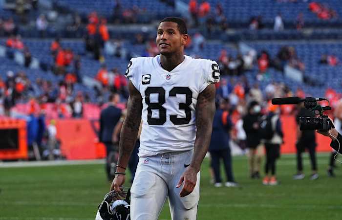 Oct 17, 2021; Denver, Colorado, USA; Las Vegas Raiders tight end Darren Waller (83) celebrates defeating the Denver Broncos at Empower Field at Mile High. Mandatory Credit: Ron Chenoy-USA TODAY Sports